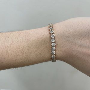 Two BR rose gold bracelets